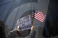 Protesters Demonstrate Outside Elite Law Firm Over Deal With Trump 