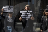 Protesters Demonstrate Outside Elite Law Firm Over Deal With Trump 