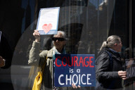 Protesters Demonstrate Outside Elite Law Firm Over Deal With Trump 
