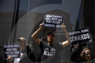 Protesters Demonstrate Outside Elite Law Firm Over Deal With Trump 