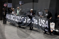 Protesters Demonstrate Outside Elite Law Firm Over Deal With Trump 