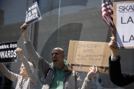Protesters Demonstrate Outside Elite Law Firm Over Deal With Trump 