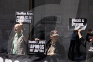 Protesters Demonstrate Outside Elite Law Firm Over Deal With Trump 