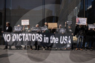 Protesters Demonstrate Outside Elite Law Firm Over Deal With Trump 