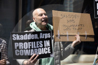 Protesters Demonstrate Outside Elite Law Firm Over Deal With Trump 