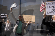 Protesters Demonstrate Outside Elite Law Firm Over Deal With Trump 