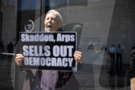 Protesters Demonstrate Outside Elite Law Firm Over Deal With Trump 