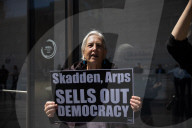 Protesters Demonstrate Outside Elite Law Firm Over Deal With Trump 