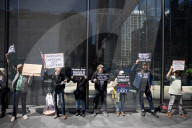 Protesters Demonstrate Outside Elite Law Firm Over Deal With Trump 