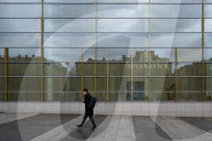 Young Man Walking In A City