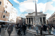 Tourists In The Historic Center Of Rome
