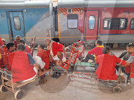 Porters Wait For Passengers, In Kolkata