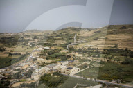 Tourists explore Victoria Citadel and its panoramic views over the island of Gozo