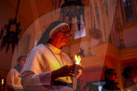 Catholic Faithful Light Candles At Easter Vigil Procession In Nepal.