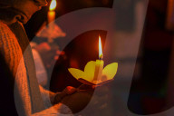 Catholic Faithful Light Candles At Easter Vigil Procession In Nepal.