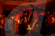 Catholic Faithful Light Candles At Easter Vigil Procession In Nepal.