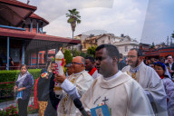 Catholic Faithful Light Candles At Easter Vigil Procession In Nepal.