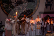 Catholic Faithful Light Candles At Easter Vigil Procession In Nepal.