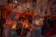 Catholic Faithful Light Candles At Easter Vigil Procession In Nepal.