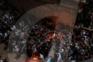 Palestinian Christians Celebrate Holy Fire In Jerusalem 