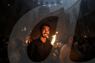 Palestinian Christians Celebrate Holy Fire In Jerusalem 