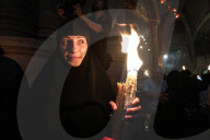 Palestinian Christians Celebrate Holy Fire In Jerusalem 