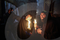 Palestinian Christians Celebrate Holy Fire In Jerusalem 