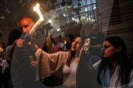 Palestinian Christians Celebrate Holy Fire In Jerusalem 