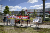 Protesteis In Front Of A Tesla Store