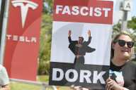 Protesteis In Front Of A Tesla Store