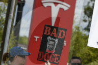 Protesteis In Front Of A Tesla Store
