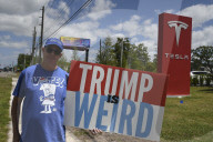 Protesteis In Front Of A Tesla Store