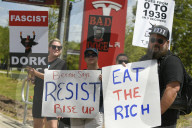 Protesteis In Front Of A Tesla Store