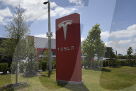 Protesteis In Front Of A Tesla Store