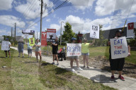 Protesteis In Front Of A Tesla Store