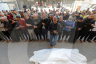 Gazans mourn relatives killed in air raid