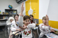 Ukrainian children forced to learn underground as Russia targets civilians