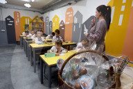 Ukrainian children forced to learn underground as Russia targets civilians