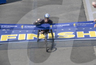 Swiss Marcel Hug wins mens wheelchair Boston Marathon