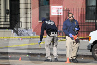 61-year-old Woman Fatally Shot To The Head And A 23-year-old Man Wounded After Being Shot To The Foot At West 113 Street And Lenox Avenue In Harlem, Manhattan, New York