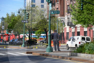 61-year-old Woman Fatally Shot To The Head And A 23-year-old Man Wounded After Being Shot To The Foot At West 113 Street And Lenox Avenue In Harlem, Manhattan, New York