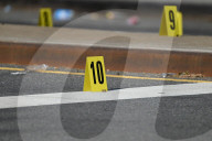 61-year-old Woman Fatally Shot To The Head And A 23-year-old Man Wounded After Being Shot To The Foot At West 113 Street And Lenox Avenue In Harlem, Manhattan, New York