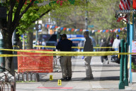 61-year-old Woman Fatally Shot To The Head And A 23-year-old Man Wounded After Being Shot To The Foot At West 113 Street And Lenox Avenue In Harlem, Manhattan, New York