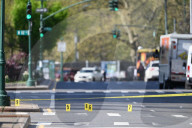 61-year-old Woman Fatally Shot To The Head And A 23-year-old Man Wounded After Being Shot To The Foot At West 113 Street And Lenox Avenue In Harlem, Manhattan, New York