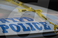 61-year-old Woman Fatally Shot To The Head And A 23-year-old Man Wounded After Being Shot To The Foot At West 113 Street And Lenox Avenue In Harlem, Manhattan, New York