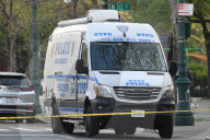 61-year-old Woman Fatally Shot To The Head And A 23-year-old Man Wounded After Being Shot To The Foot At West 113 Street And Lenox Avenue In Harlem, Manhattan, New York