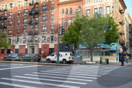 61-year-old Woman Fatally Shot To The Head And A 23-year-old Man Wounded After Being Shot To The Foot At West 113 Street And Lenox Avenue In Harlem, Manhattan, New York