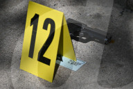 61-year-old Woman Fatally Shot To The Head And A 23-year-old Man Wounded After Being Shot To The Foot At West 113 Street And Lenox Avenue In Harlem, Manhattan, New York