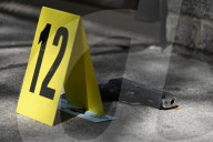 61-year-old Woman Fatally Shot To The Head And A 23-year-old Man Wounded After Being Shot To The Foot At West 113 Street And Lenox Avenue In Harlem, Manhattan, New York