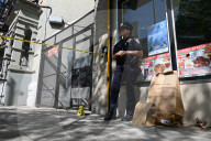 61-year-old Woman Fatally Shot To The Head And A 23-year-old Man Wounded After Being Shot To The Foot At West 113 Street And Lenox Avenue In Harlem, Manhattan, New York